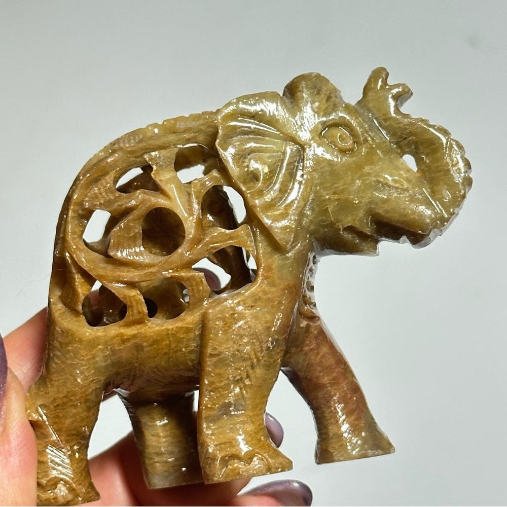 Hand-carved Elephant Sculpture from Thailand. Mother elephant and baby inside